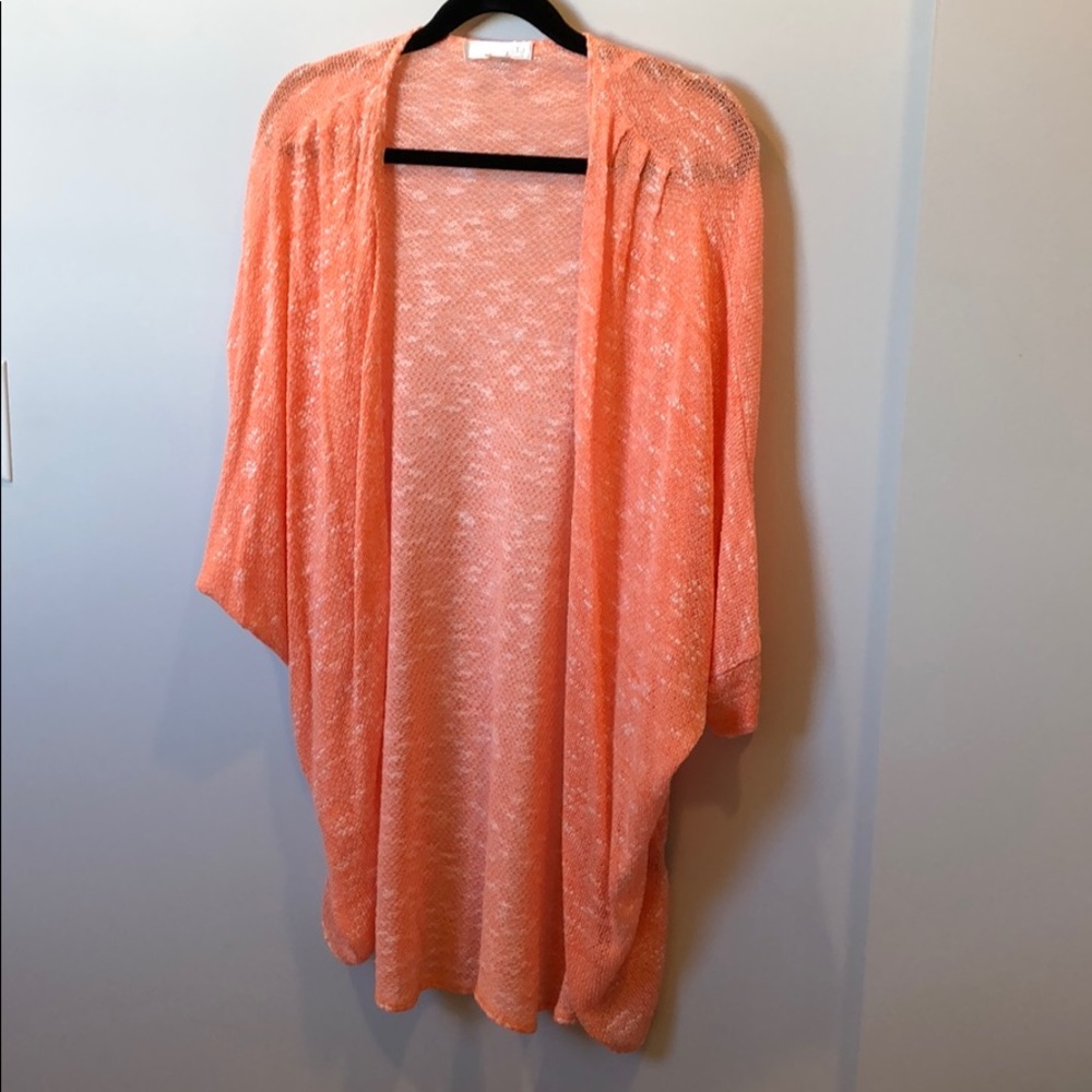 SayWhat? Drapey cardigan in peachy -orange/white